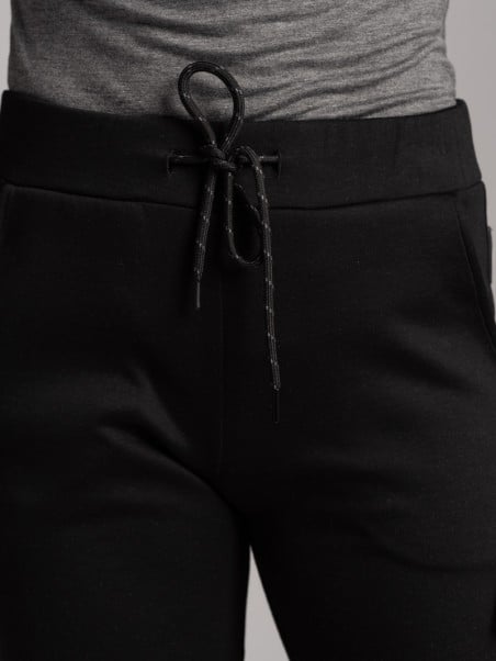 Jogger TECNO de mujer en tejido bicolor con cremalleras invisibles