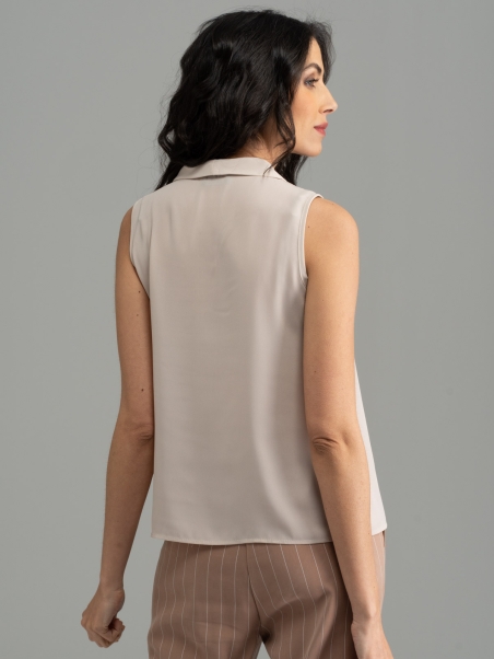 Camisa de mujer sin mangas de color liso con reverso