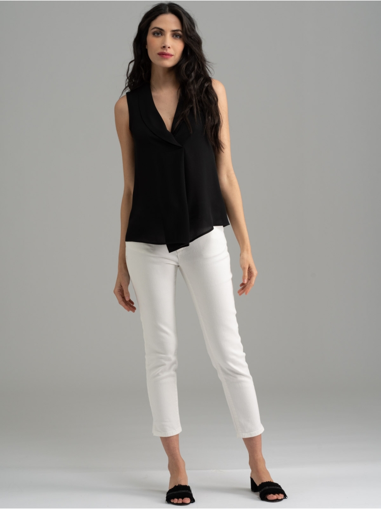 Camisa de mujer sin mangas de color liso con reverso