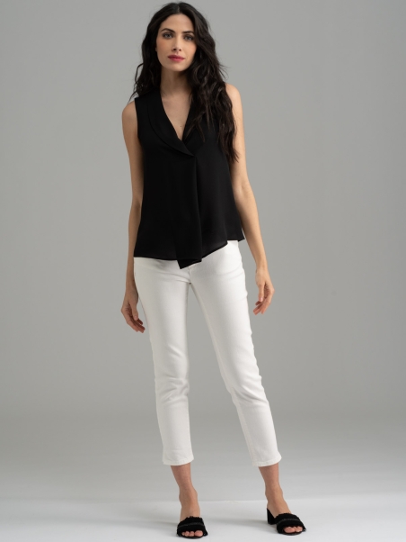 Camisa de mujer sin mangas de color liso con reverso