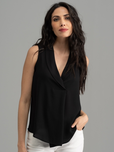 Camisa de mujer sin mangas de color liso con reverso