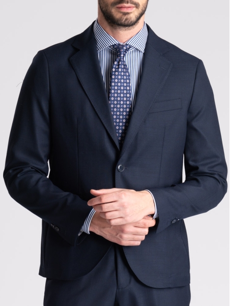 Traje de hombre en tejido azul de lana fría