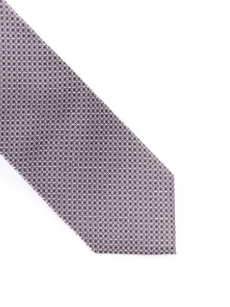 Corbata de hombre en jacquard de seda con microdiseño geométrico