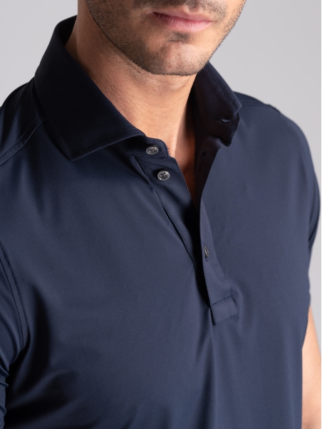 Polo azul TECNO de media manga para hombre con cuello camisero