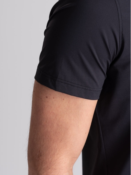 Polo negro de media manga TECNO para hombre con cuello camisero