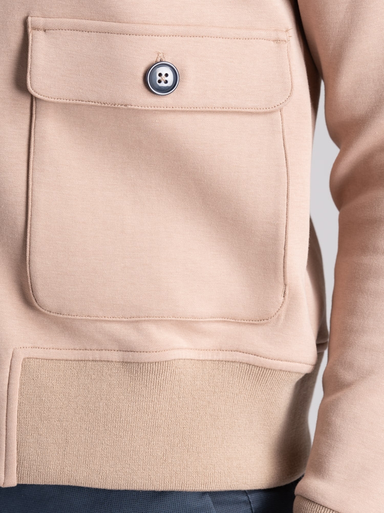 Cazadora bomber de punto para hombre con botonadura y bolsillos