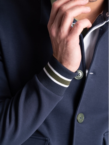 Cazadora bomber de punto para hombre con botonadura y bolsillos