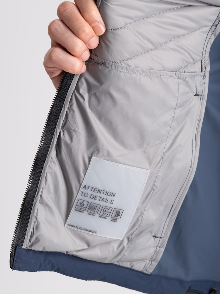 Chaqueta deportiva para hombre con dos tejidos y acolchado delante