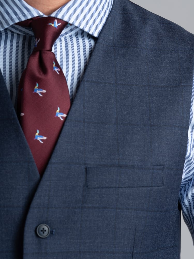 Chaleco azul de hombre con motivo Madrás y espalda de raso