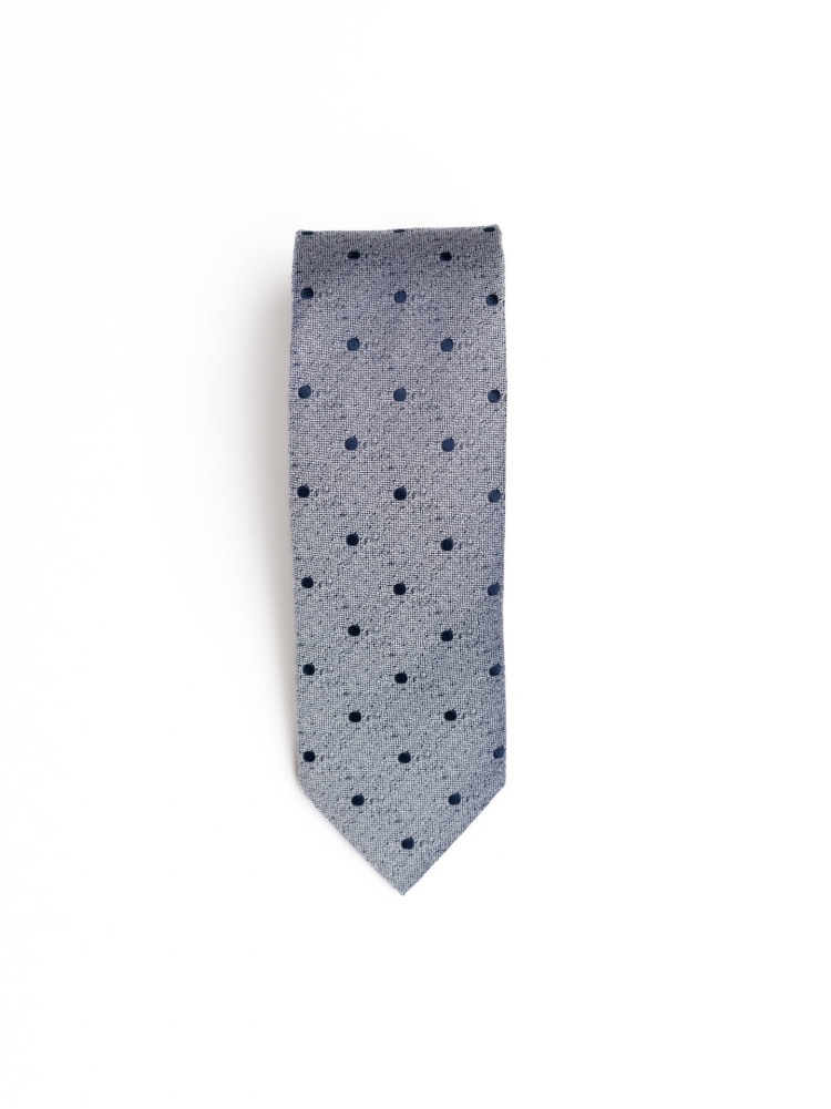 Corbata de seda con lunares sobre fondo melange