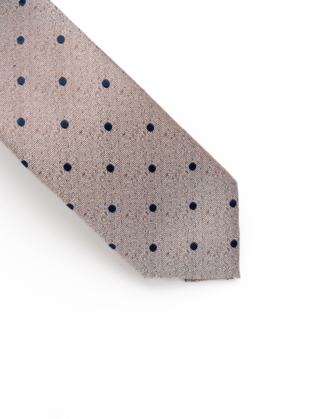 Corbata de seda con lunares sobre fondo melange