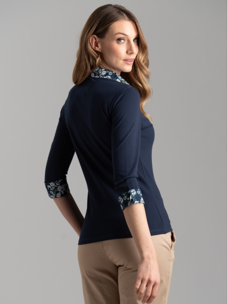 Polo de mujer de manga tres cuartos con inserciones estampadas