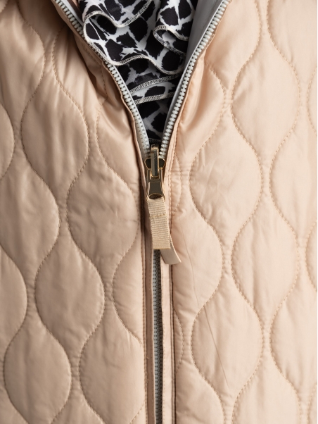 Chaqueta reversible para mujer de 100 g con capucha