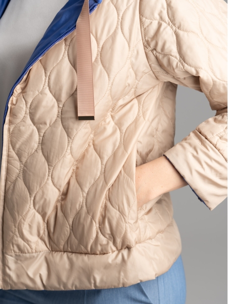 Chaqueta reversible para mujer de 100 g con capucha