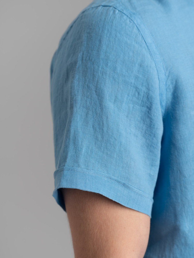 Camicia polo uomo azzurra di lino a mezza manica