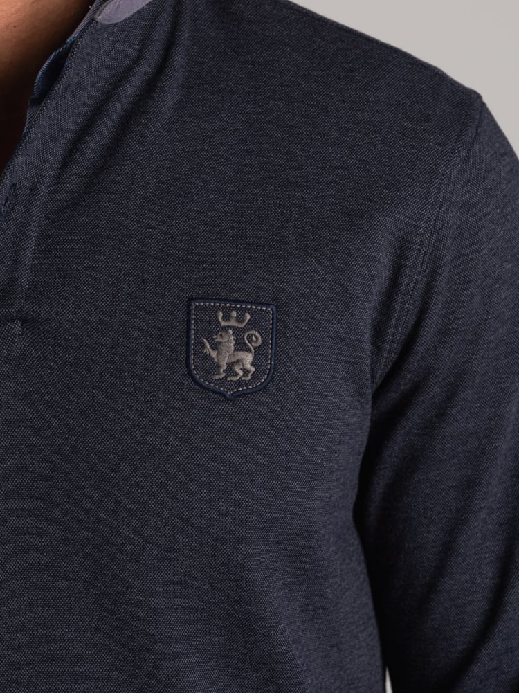 Polo de piqué técnico para hombre con detalles refinados